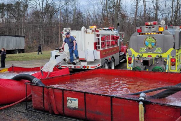 Tanker 64 providing water as a fill site.